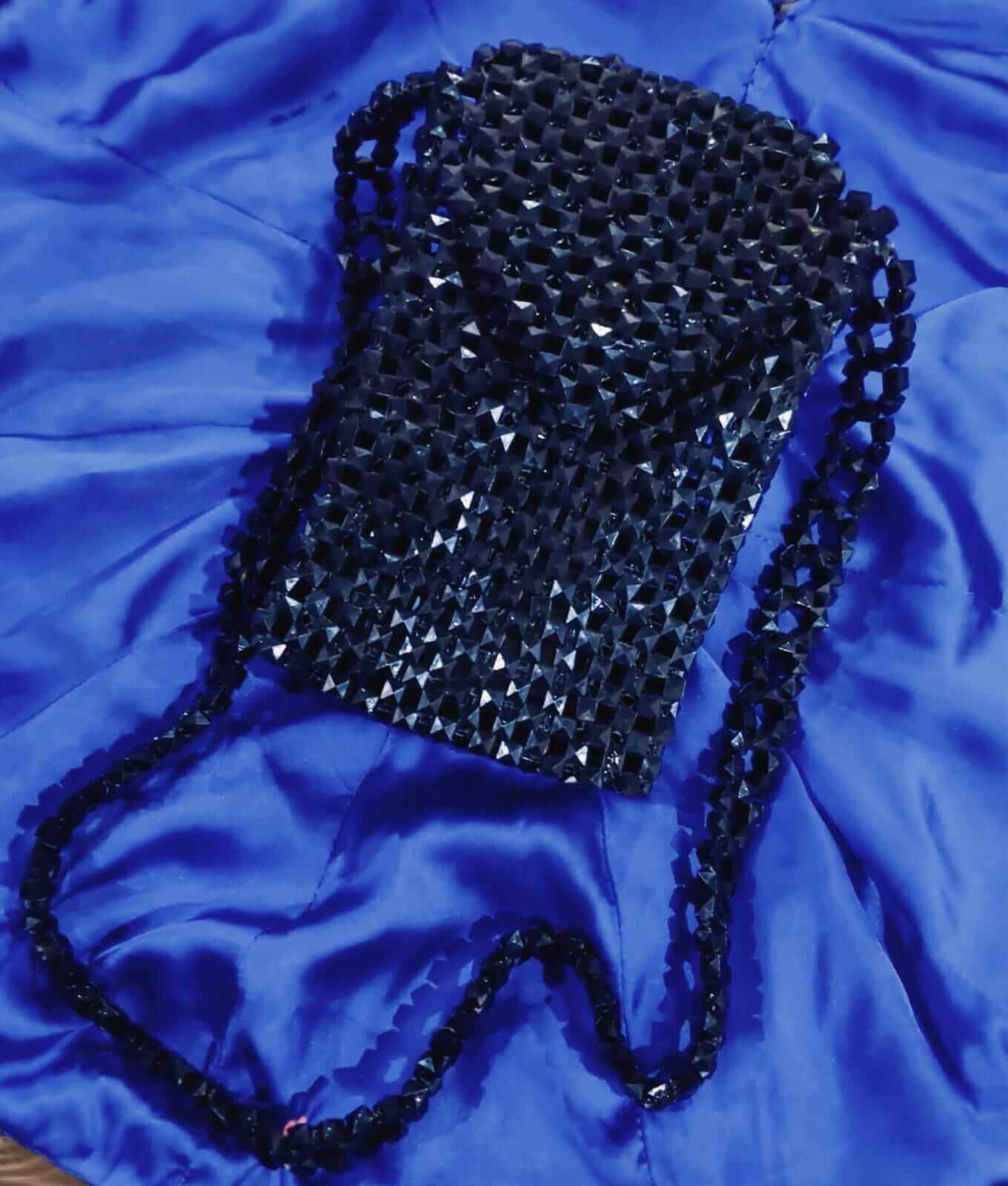 Black beaded handbag, Rungrez